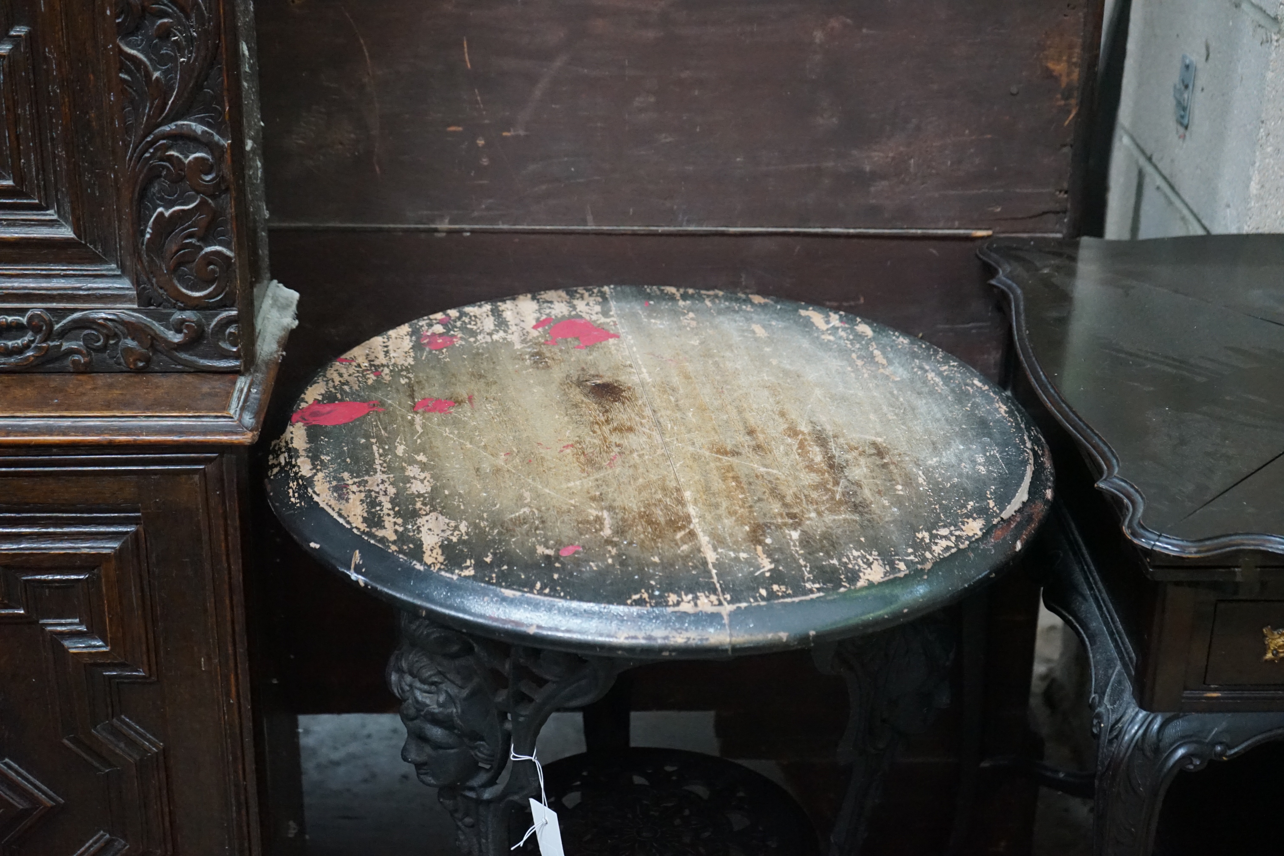 A cast iron Britannia circular table, diameter 58cm height 70cm